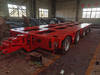 Jushixin One-line multi-axle hydraulic steering construction machinery low flatbed semi trailer